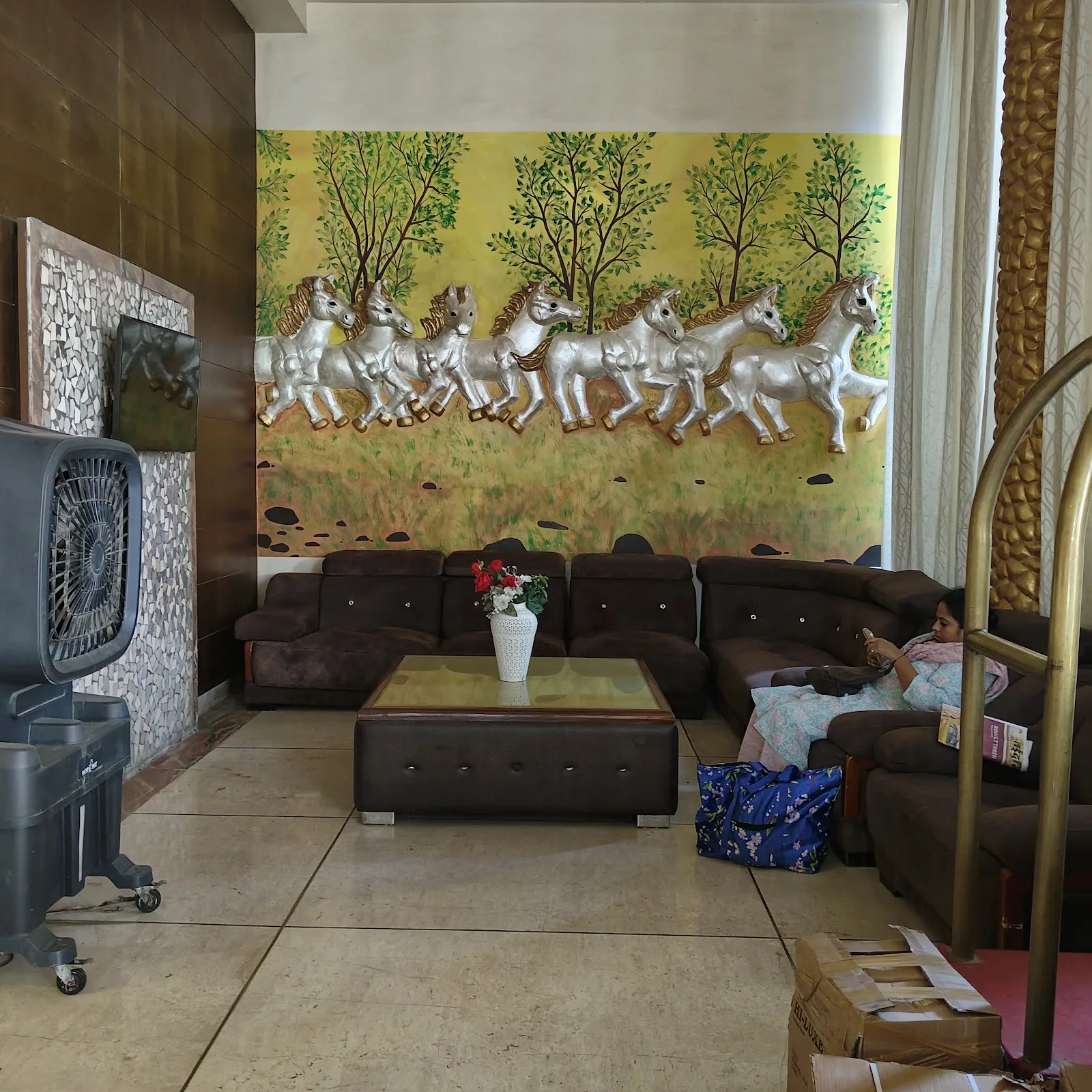 Seven-horses mural in the hotel lobby
